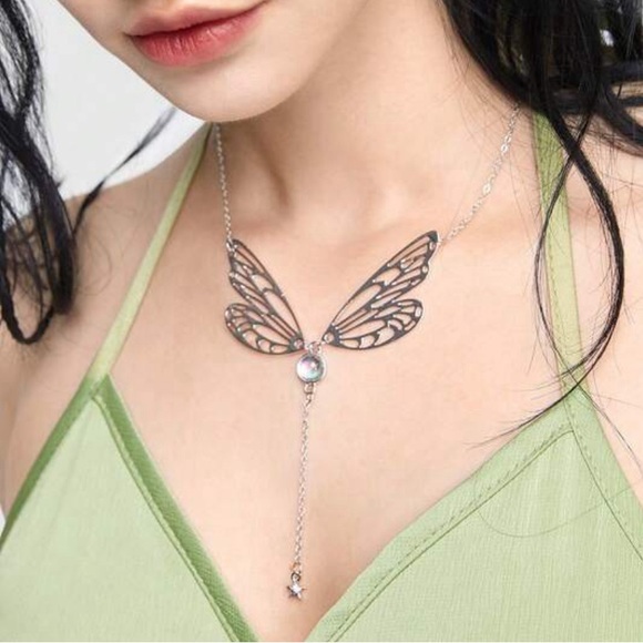 Jewelry - Butterfly wing tassel necklace. New.